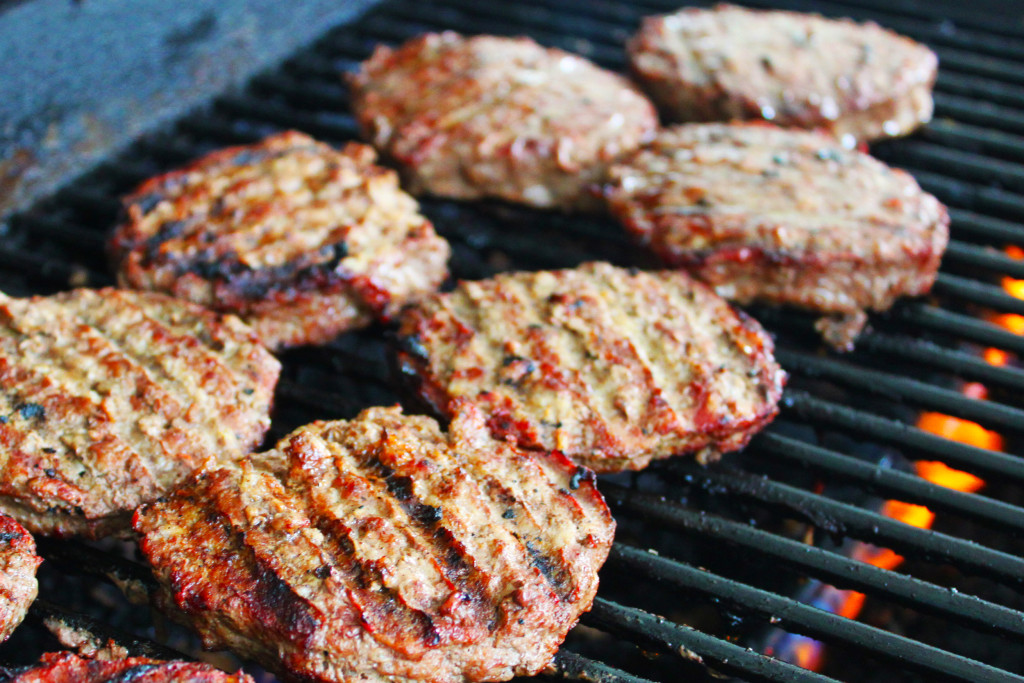 Hamburger patties on a grill